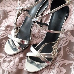 Silver strappy heels
